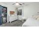 Serene bedroom with a dresser, ample closet space, and comfortable carpeting at 15348 W Banff Ln, Surprise, AZ 85379