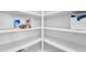 Well-organized pantry with ample shelving at 17198 W Fetlock Trl, Surprise, AZ 85387