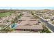 Community view showing luxury homes and golf course at 18111 W Desert Sage Dr, Goodyear, AZ 85338