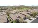 Aerial view of a single Gathering home with a view of the golf course at 18111 W Desert Sage Dr, Goodyear, AZ 85338