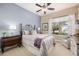 Bright bedroom with a comfortable bed and plenty of natural light at 18111 W Desert Sage Dr, Goodyear, AZ 85338