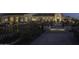 Elegant clubhouse patio with stone pathway and lighting at 18111 W Desert Sage Dr, Goodyear, AZ 85338