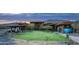Modern clubhouse with mountain views and outdoor seating at 18111 W Desert Sage Dr, Goodyear, AZ 85338