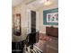 Elegant entryway with piano, hardwood floors, and decorative accents at 18111 W Desert Sage Dr, Goodyear, AZ 85338