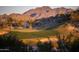 Scenic golf course view with mountain backdrop at 18111 W Desert Sage Dr, Goodyear, AZ 85338