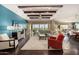 Open living room with hardwood floors and a view of the backyard at 18111 W Desert Sage Dr, Goodyear, AZ 85338