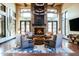 Cozy lounge with fireplace and comfortable seating at 18111 W Desert Sage Dr, Goodyear, AZ 85338