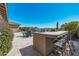 Outdoor kitchen with bar seating, perfect for entertaining at 18111 W Desert Sage Dr, Goodyear, AZ 85338