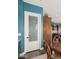 Walk-in pantry with glass door and ample storage shelving at 18111 W Desert Sage Dr, Goodyear, AZ 85338