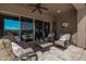 Outdoor seating area with a covered patio, comfortable furniture, and views at 18111 W Desert Sage Dr, Goodyear, AZ 85338