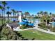 Aerial view of community pool with lighthouse water slide at 18111 W Desert Sage Dr, Goodyear, AZ 85338