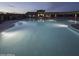 Inviting community pool with lighting and seating at 18111 W Desert Sage Dr, Goodyear, AZ 85338