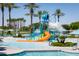 Community waterpark with slides and splash pad at 18111 W Desert Sage Dr, Goodyear, AZ 85338
