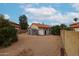 Large backyard with storage sheds and citrus trees at 18429 N 16Th Way, Phoenix, AZ 85022