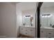 Modern bathroom with double vanity and quartz countertops at 18429 N 16Th Way, Phoenix, AZ 85022