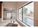 Kitchen with stainless steel sink and pool view at 18429 N 16Th Way, Phoenix, AZ 85022