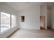 Bright living room with pool view and access to kitchen at 18429 N 16Th Way, Phoenix, AZ 85022