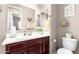 Guest bathroom with single vanity and toilet at 19000 E Old Beau Trl, Queen Creek, AZ 85142