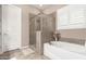 Bathroom boasts a large soaking tub and a walk-in shower at 19000 E Old Beau Trl, Queen Creek, AZ 85142