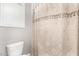 Clean bathroom with a toilet and shower curtain at 19000 E Old Beau Trl, Queen Creek, AZ 85142