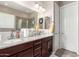 Double vanity bathroom with granite countertops at 19000 E Old Beau Trl, Queen Creek, AZ 85142