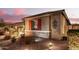 Beautiful home with a two-car garage and red shutters at 19000 E Old Beau Trl, Queen Creek, AZ 85142