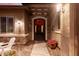 Elegant entryway with wrought-iron gate and stone accents at 19000 E Old Beau Trl, Queen Creek, AZ 85142