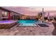Refreshing pool and spa with patio and landscaping at 19000 E Old Beau Trl, Queen Creek, AZ 85142