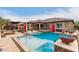 Inviting pool and spa area with ample patio space at 19000 E Old Beau Trl, Queen Creek, AZ 85142