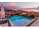 Inviting swimming pool with fire features and patio at 19000 E Old Beau Trl, Queen Creek, AZ 85142