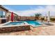Spacious pool and spa area with a beautiful stone surround at 19000 E Old Beau Trl, Queen Creek, AZ 85142