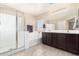 Bright bathroom featuring a shower, bath tub, double sink vanity, and tile floors at 2036 E Stacey Rd, Gilbert, AZ 85298
