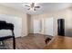 Spacious room with wood-look tile and closet storage at 2036 E Stacey Rd, Gilbert, AZ 85298