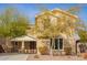 Charming two-story home with covered front porch and mature landscaping at 2036 E Stacey Rd, Gilbert, AZ 85298