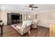 Upstairs loft featuring tile floors, cozy seating, and an entertainment center at 2036 E Stacey Rd, Gilbert, AZ 85298