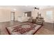 Inviting loft area with wood flooring, comfortable seating, and soft natural light at 2036 E Stacey Rd, Gilbert, AZ 85298