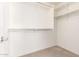 Walk-in closet with shelving and plenty of storage space at 2036 E Stacey Rd, Gilbert, AZ 85298