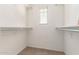 Walk-in closet with shelving for organized storage at 2036 E Stacey Rd, Gilbert, AZ 85298