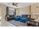Comfortable living room with ceiling fan and fireplace at 2150 W Alameda Rd # 1313, Phoenix, AZ 85085