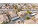 Aerial view of a residential area showing homes, landscaping, and a street at 2201 N Comanche Dr # 1075, Chandler, AZ 85224