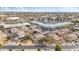 Aerial view of community showing building exteriors, parking, and landscaping at 2201 N Comanche Dr # 1075, Chandler, AZ 85224