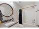 Clean bathroom with a tub, shower, and updated vanity at 2201 N Comanche Dr # 1075, Chandler, AZ 85224