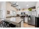 Modern kitchen with stainless steel appliances and a large island at 2201 N Comanche Dr # 1075, Chandler, AZ 85224