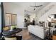 Open living area with gray sofa and high ceilings at 2201 N Comanche Dr # 1075, Chandler, AZ 85224