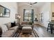 Spacious living room with comfortable seating and large windows at 2201 N Comanche Dr # 1075, Chandler, AZ 85224
