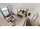 High-angle view of living room, kitchen, and staircase at 2201 N Comanche Dr # 1075, Chandler, AZ 85224