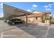 Covered carport parking with additional open parking at 2201 N Comanche Dr # 1075, Chandler, AZ 85224