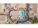 An overhead view of a refreshing blue swimming pool within a residential complex at 2201 N Comanche Dr # 1075, Chandler, AZ 85224