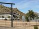 Mobile home with fenced yard and mountain views at 2363 W Daniel Rd, Queen Creek, AZ 85144