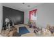 Bedroom with a window and multiple items at 31637 W Grant St, Buckeye, AZ 85326